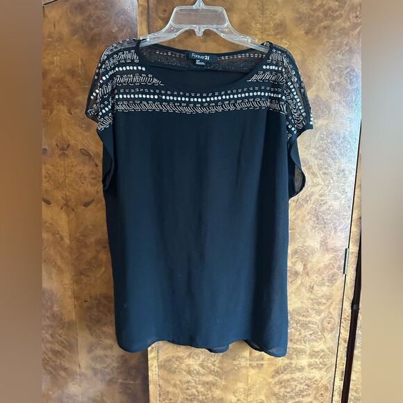 Black sheer top with silver adorned accents - Picture 1 of 6